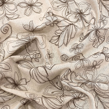 Brown embroidered linen fabric on a sand beige background